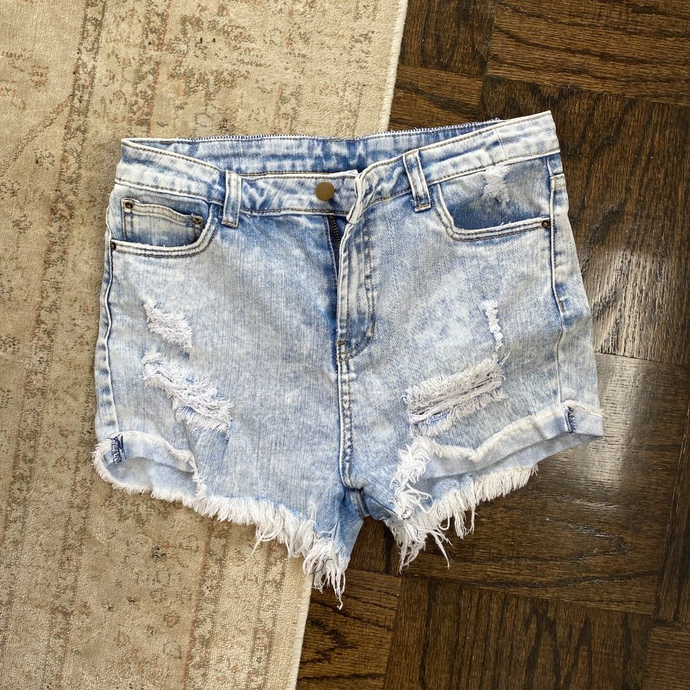 Acid washed ripped jean shorts
